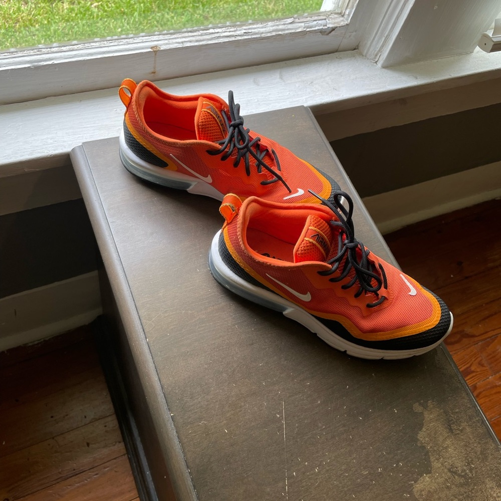 Orange Nikes Youth Size 6